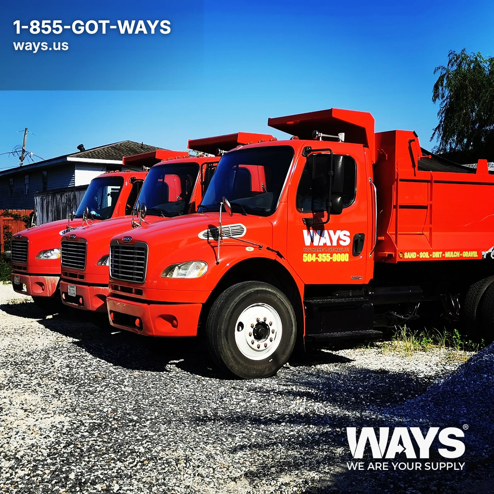 Three red WAYS Materials dump trucks parked and ready for bulk material delivery in New Orleans Metro