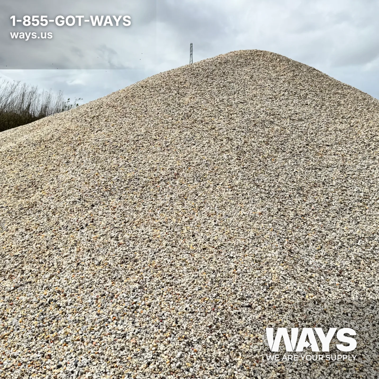 Large stockpile of rounded pea gravel at WAYS Materials yard in New Orleans