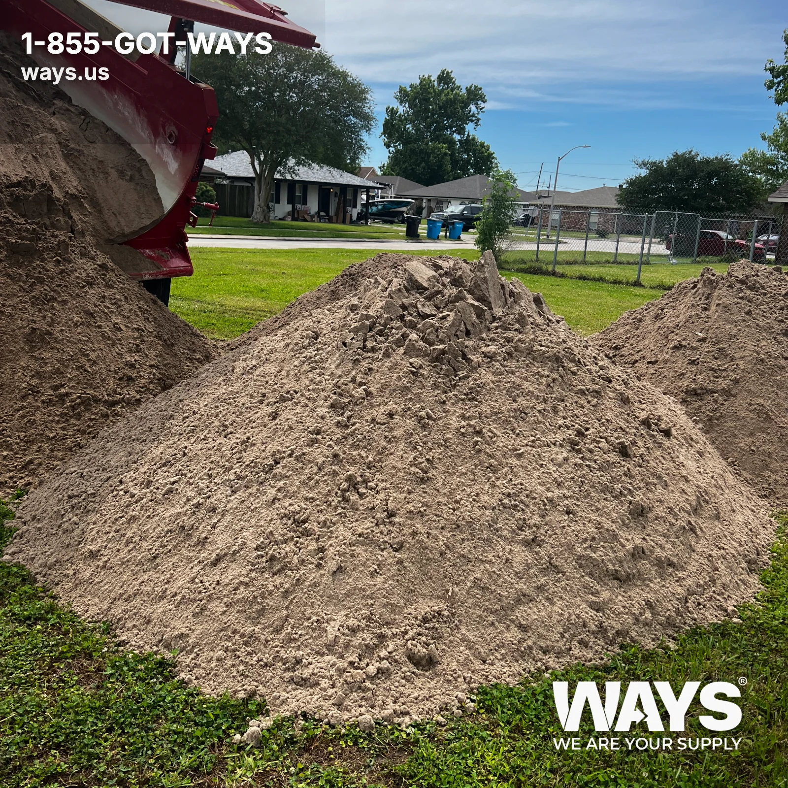 Multiple piles of dredged river sand just delivered to a residential yard in the Greater New Orleans area