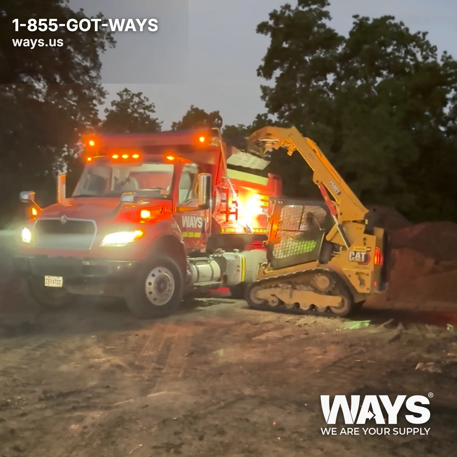 Dump truck unloading bulk concrete sand on a residential job site
